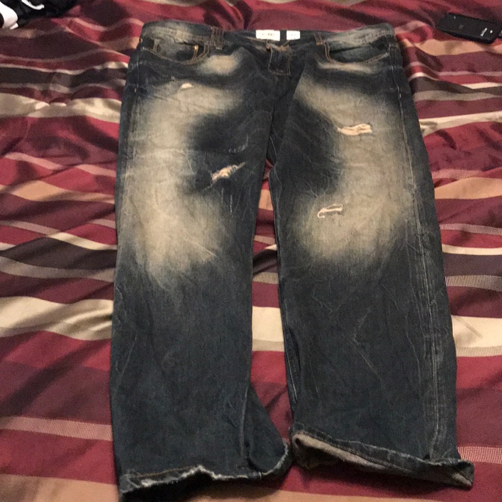 Distressed ripped jeans